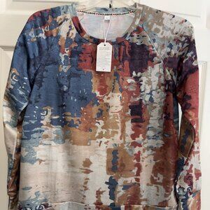 NWT Women's Size Large Multi Color Pull Over Shirt.